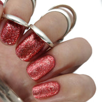 gel polish nail nails red glitter shimmer bright red festive christmas metallic silver specs